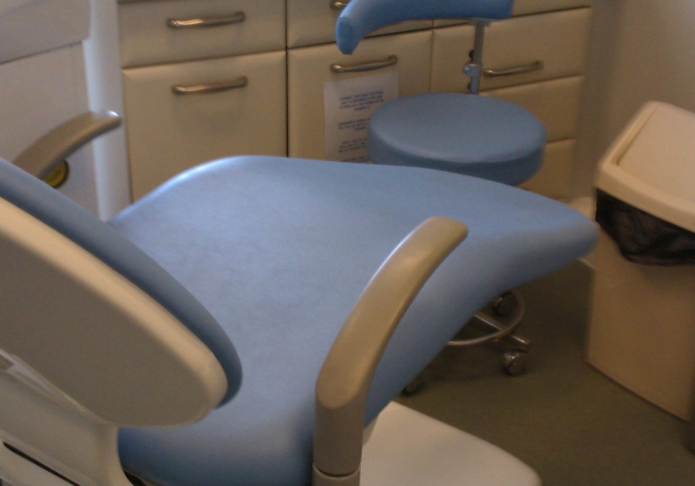 Blue surgery chair with brand new reupholstered ambla vinyl textile
